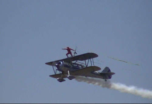 Eddie Andreini's Stearman with a Wingwalker